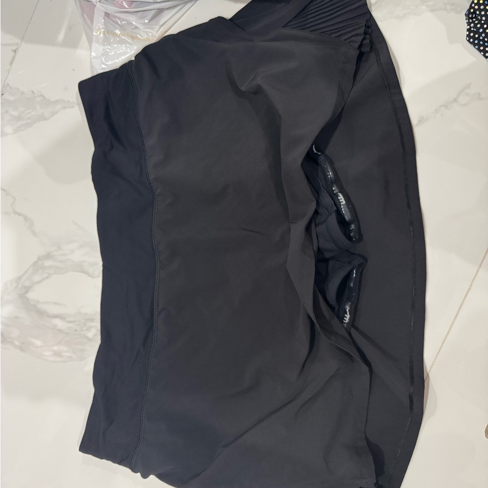 Lululemon Play off the pleats mid rise skirt -size 12 Black